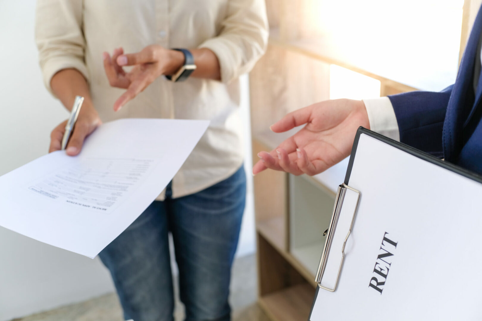 Sales manager giving advice application form document, consideri
