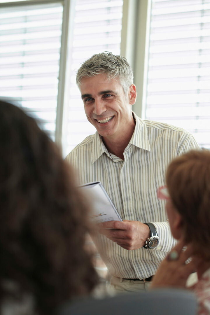 Smiling business man in discussion
